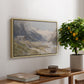 Shepherds (Pasterze), c. 1921 by Edward Theodore Compton, presented in a natural wood floater framed canvas featuring a small group of shepherds in alpine landscape with grazing animals, displayed above a hallway console table.