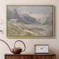 Natural wood floater framed canvas featuring a rural alpine setting with shepherds and open terrain, displayed above a cabinet in a soft-toned living room.