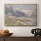 Shepherds (Pasterze), c. 1921 by Edward Theodore Compton in a natural wood floater framed canvas displayed above a console table in a hallway, featuring a natural landscape with human presence among mountains.