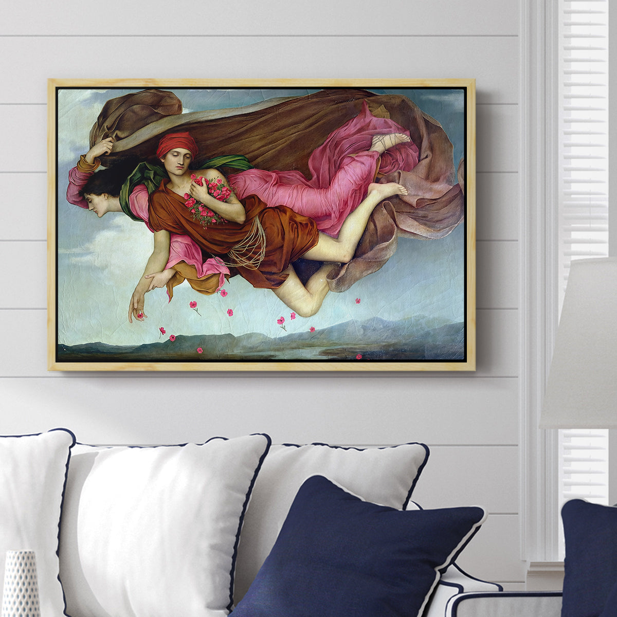 Night and Sleep, 1878 by Evelyn De Morgan displayed above a sofa in a living room in a natural wood floater frame, featuring a symbolic depiction of night and sleep as ethereal figures in motion.