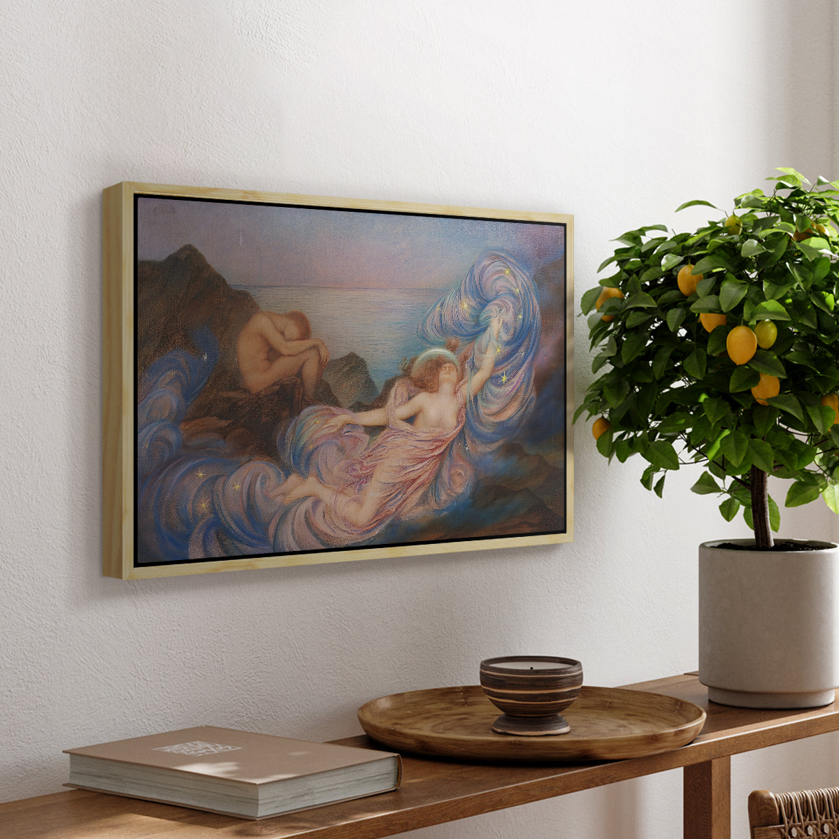 Twilight, 1914 by Evelyn De Morgan, presented in a natural wood floater framed canvas featuring a reclining female figure beneath glowing sky at twilight with soft colors, displayed above a hallway console table.
