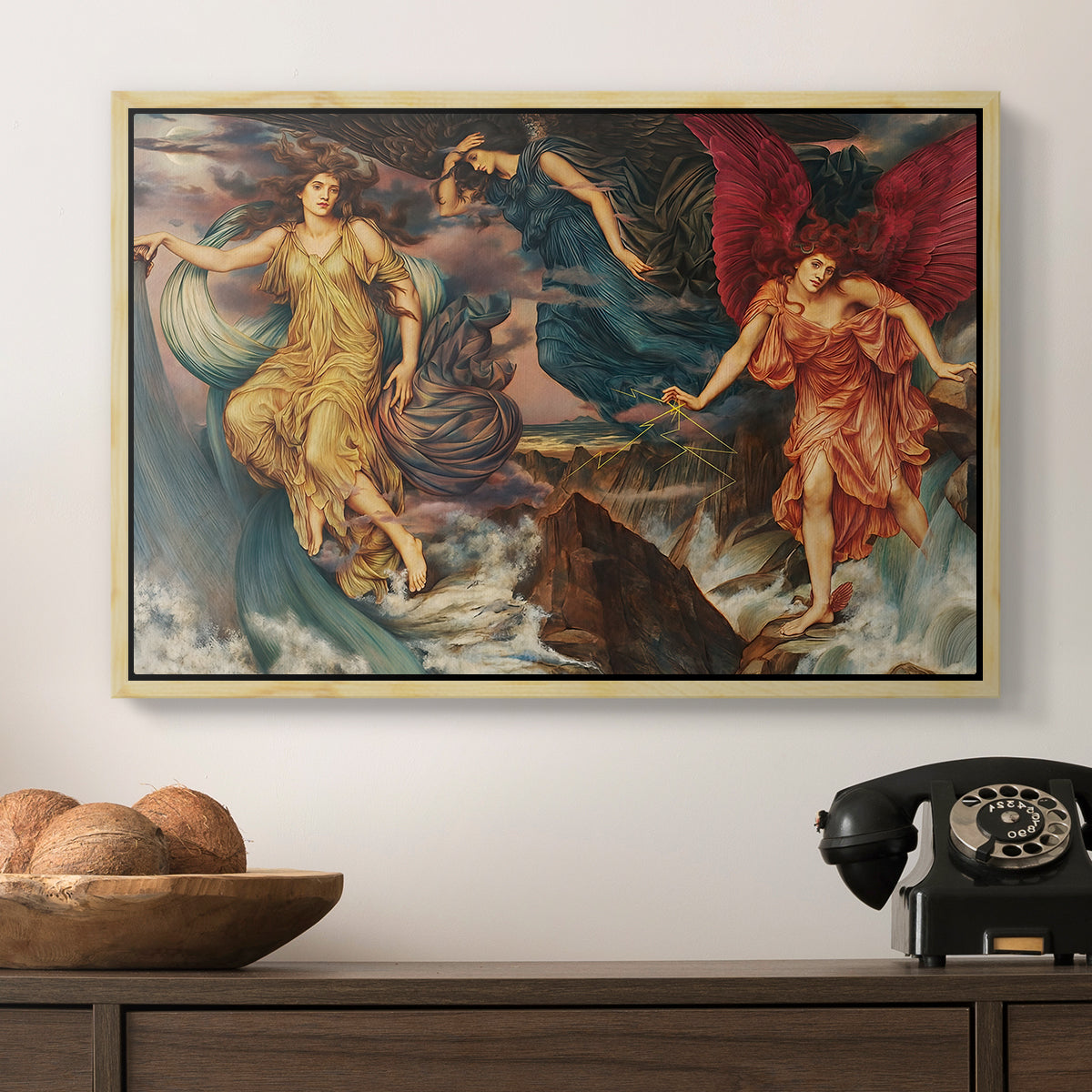The Storm Spirits, 1900 by Evelyn De Morgan in a natural wood floater framed canvas displayed above a console table in a hallway, featuring a symbolic scene of airborne figures in chaotic movement.