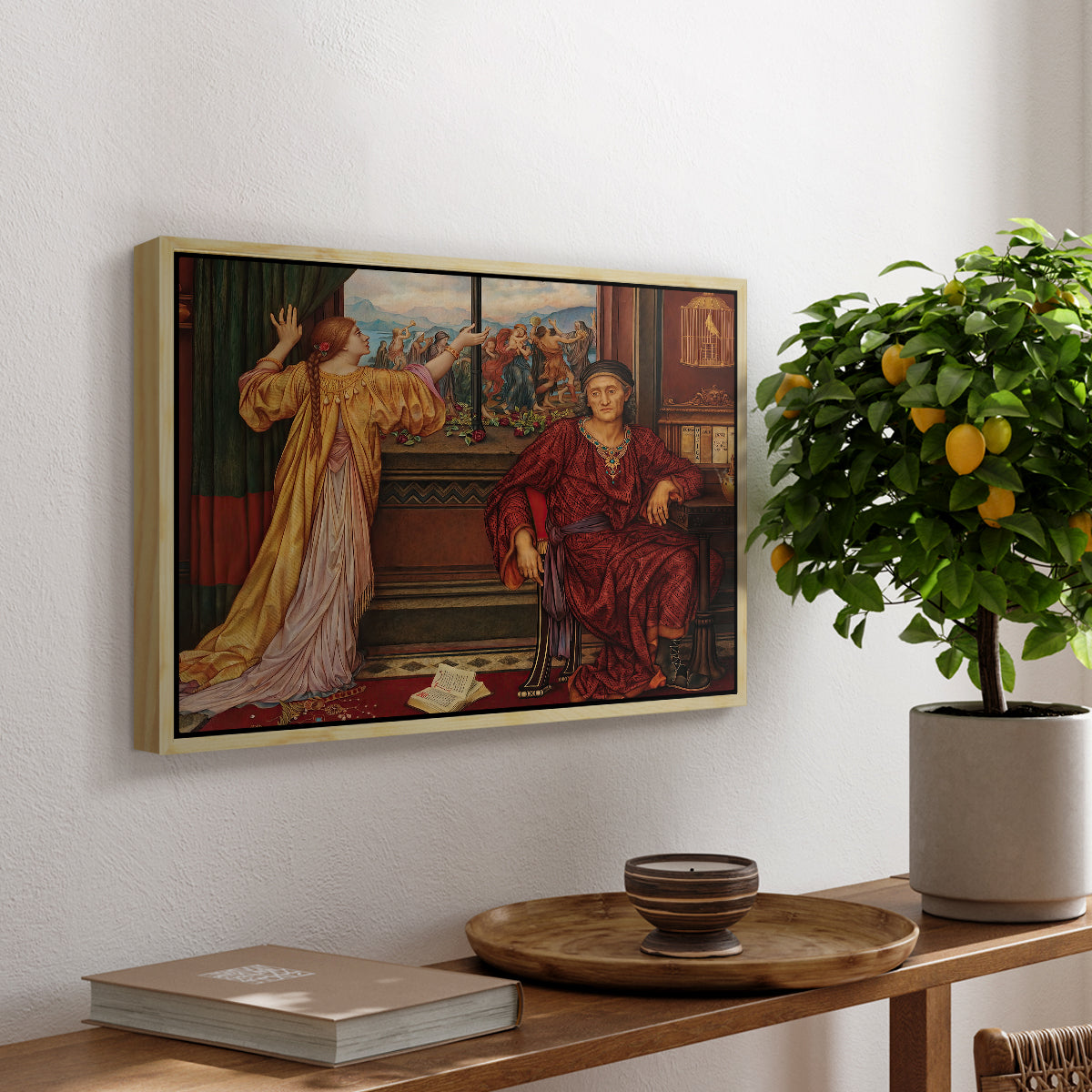 The Gilded Cage, c. 1901-1902 by Evelyn De Morgan, presented in a natural wood floater framed canvas featuring a woman seated inside ornate interior symbolizing confinement and luxury, displayed above a hallway console table.