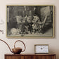 Natural wood floater framed canvas featuring an intimate interior with players focused on board and pieces, displayed above a cabinet in a soft-toned living room.