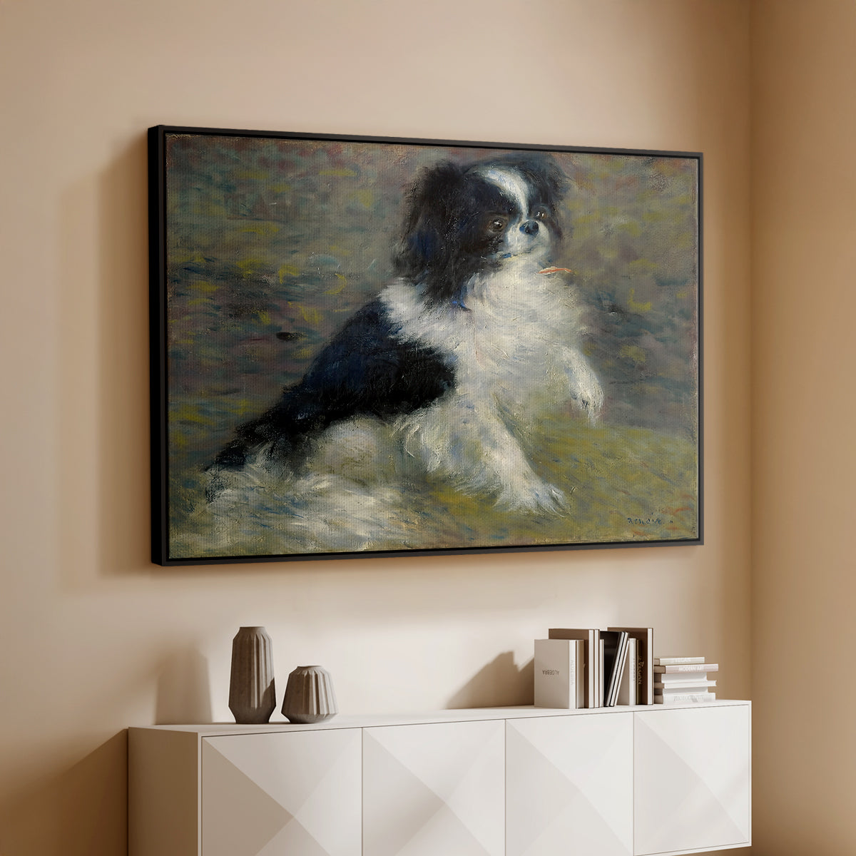 Black floater framed canvas of Tama, the Japanese Dog, c. 1876 by Pierre-Auguste Renoir, featuring an impressionist painting of a dog wading through water with blurred background above a console cabinet in a minimalist entryway.