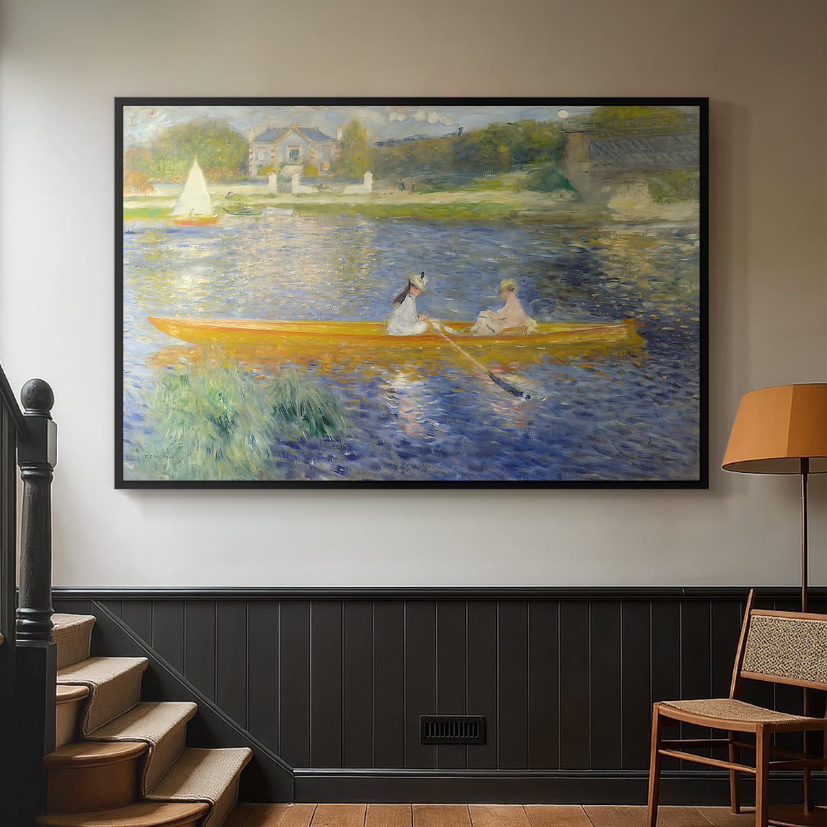 Black floater framed canvas featuring a leisure scene of figures in a small rowboat on tranquil water, displayed in a hallway near a staircase.