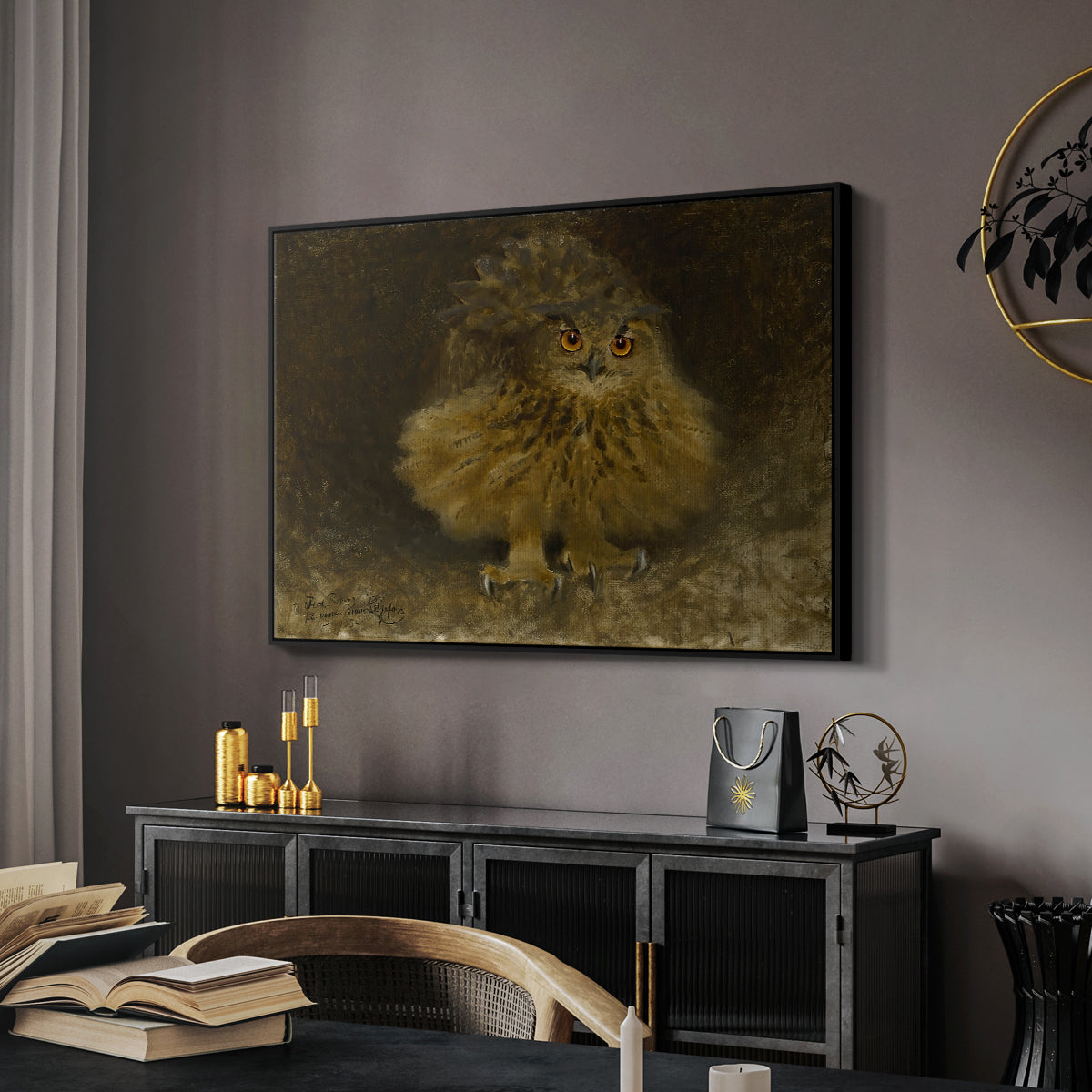 An Eagle Owl (Berguv), 1905 by Bruno Liljefors in a black floater framed canvas featuring a bird of prey resting on tree branch with textured feathers, displayed above a desk in a dark home office interior.