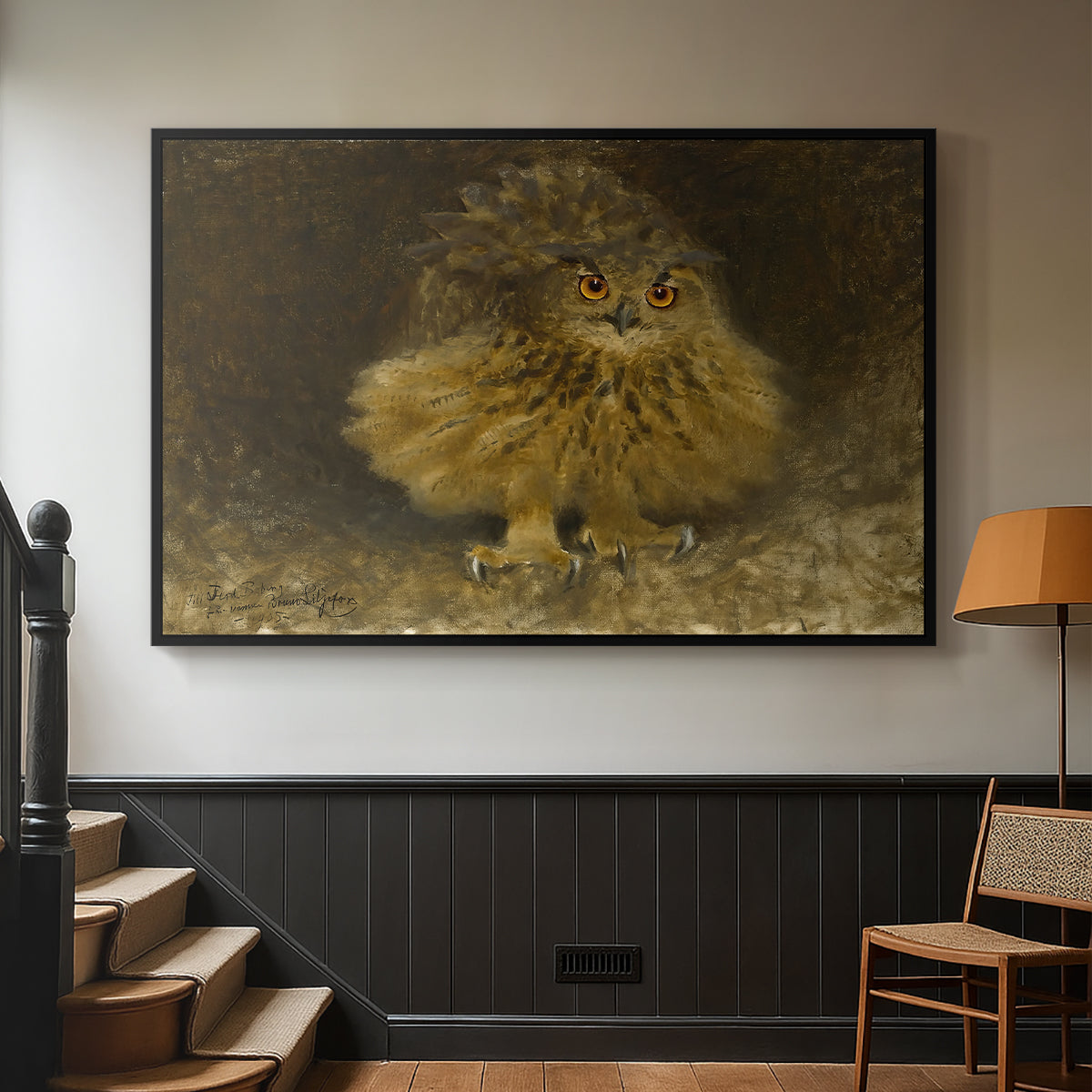 Black floater framed canvas featuring a realistic depiction of owl camouflaged within woodland environment, displayed in a hallway near a staircase.