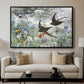 Common Swifts, 1886 by Bruno Liljefors displayed in a black floater framed canvas above a sofa in a clean living room.