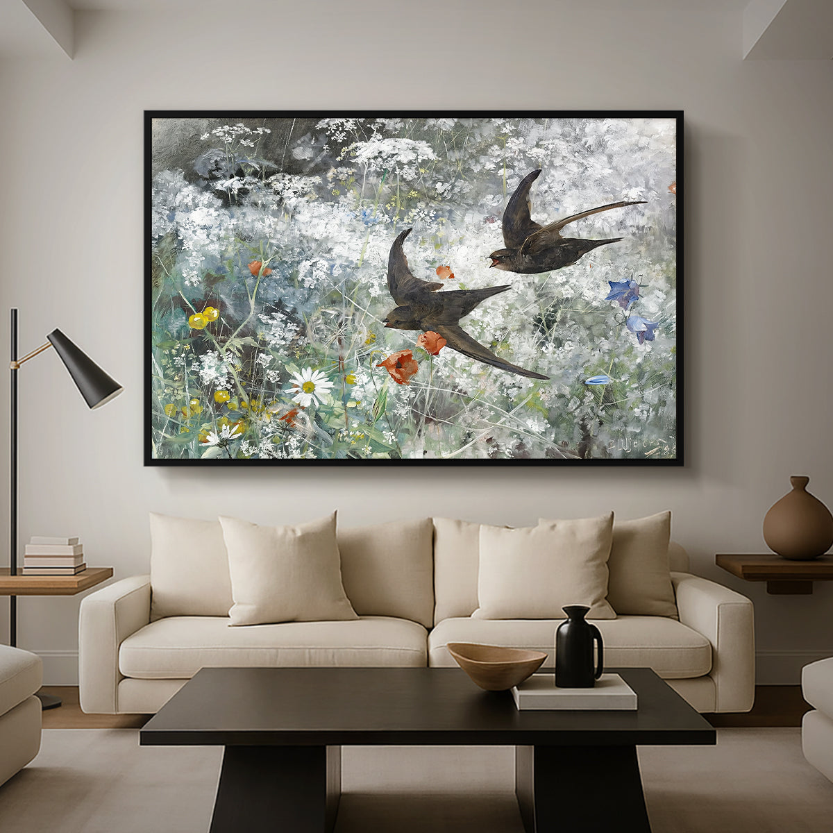 Common Swifts, 1886 by Bruno Liljefors as a black floater framed canvas featuring a flock of birds in flight soaring across open sky above landscape, displayed above a sofa in a modern living room.