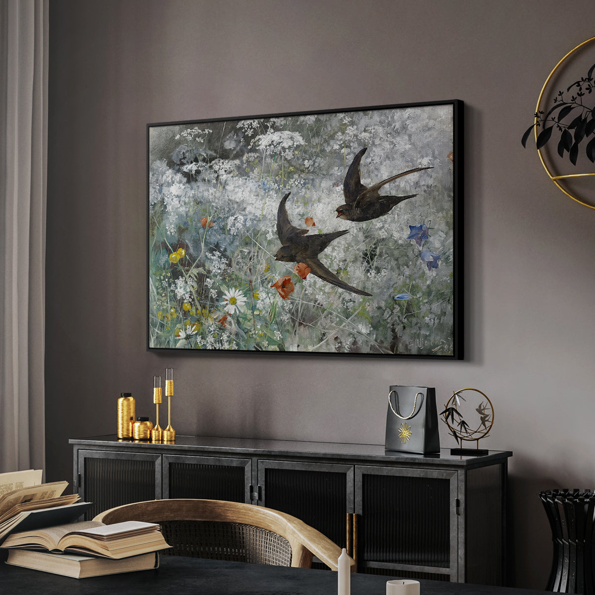 Common Swifts, 1886 by Bruno Liljefors in a black floater framed canvas featuring a multiple birds flying together in natural outdoor scene, displayed above a desk in a dark home office interior.