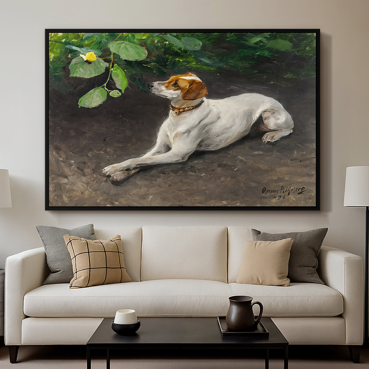 Portrait of a Dog, 1891 by Bruno Liljefors displayed in a black floater framed canvas above a sofa in a clean living room.