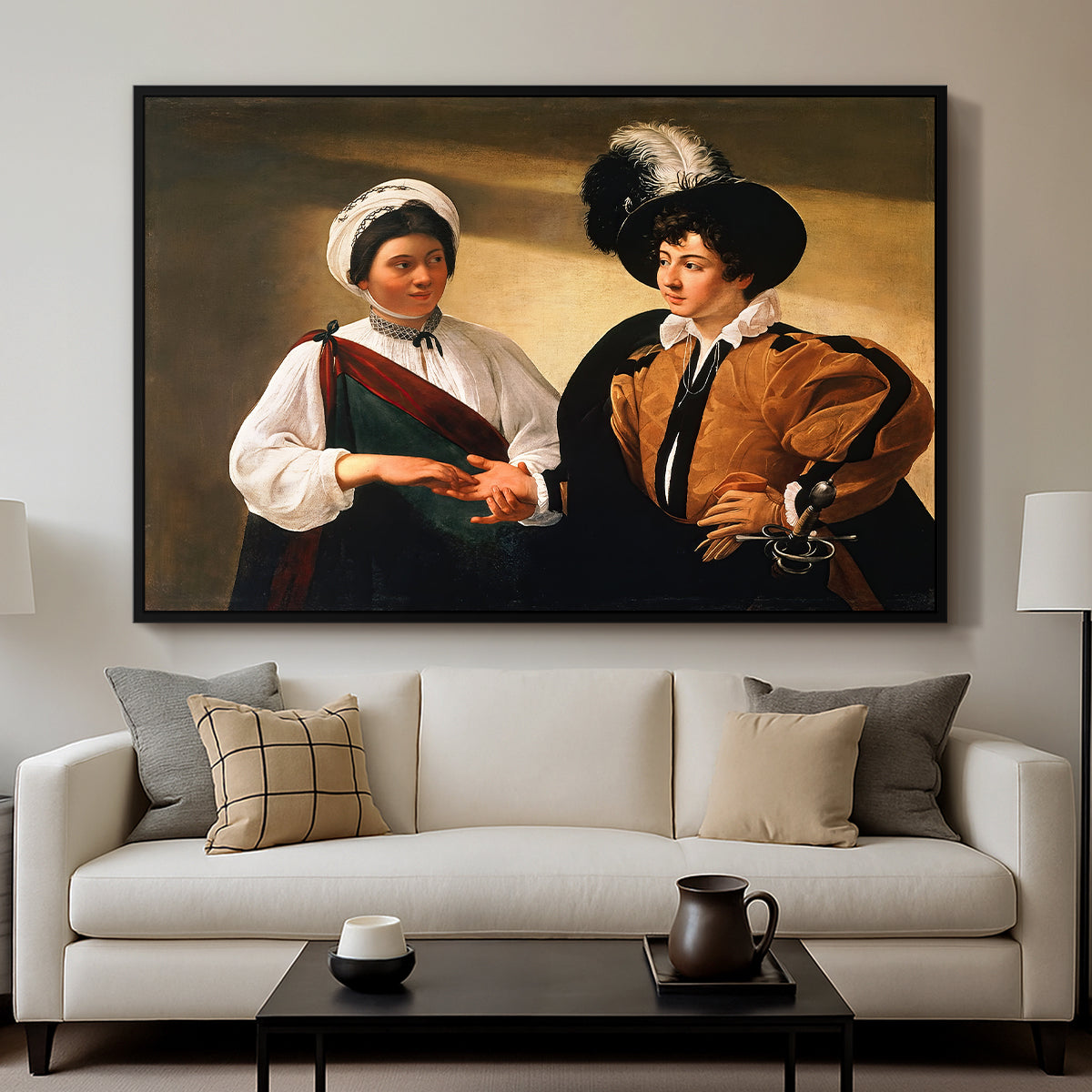The Fortune Teller (Louvre Version), c. 1595 by Caravaggio displayed in a black floater framed canvas above a sofa in a clean living room.