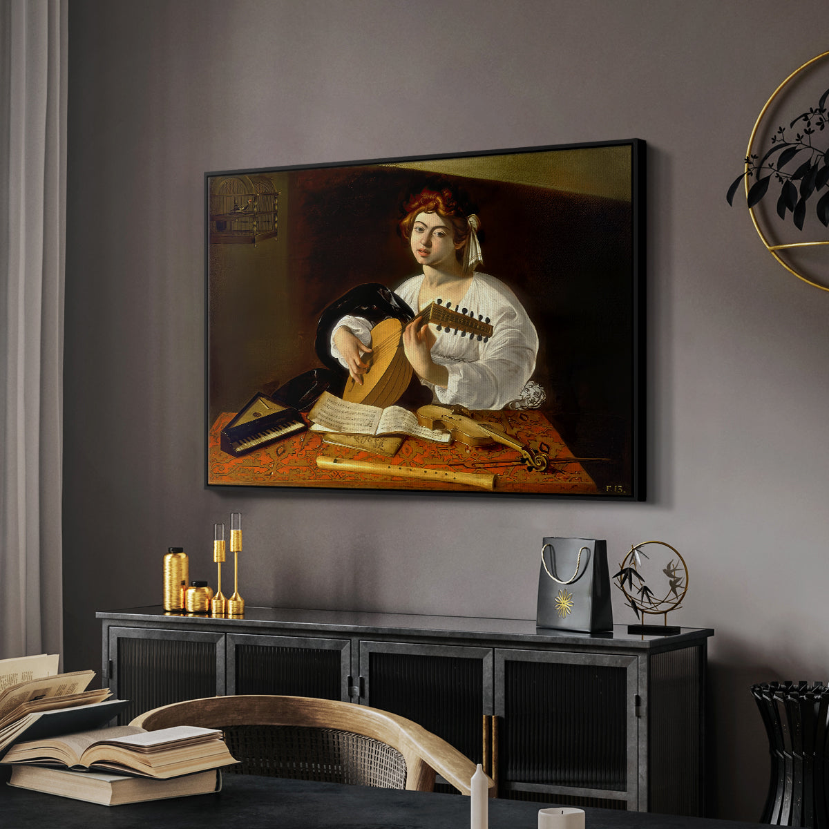 The Lute Player (Wildenstein Version), c. 1596 by Caravaggio in a black floater framed canvas featuring a detailed scene of youth playing string instrument with fruit and flowers nearby, displayed above a desk in a dark home office interior.