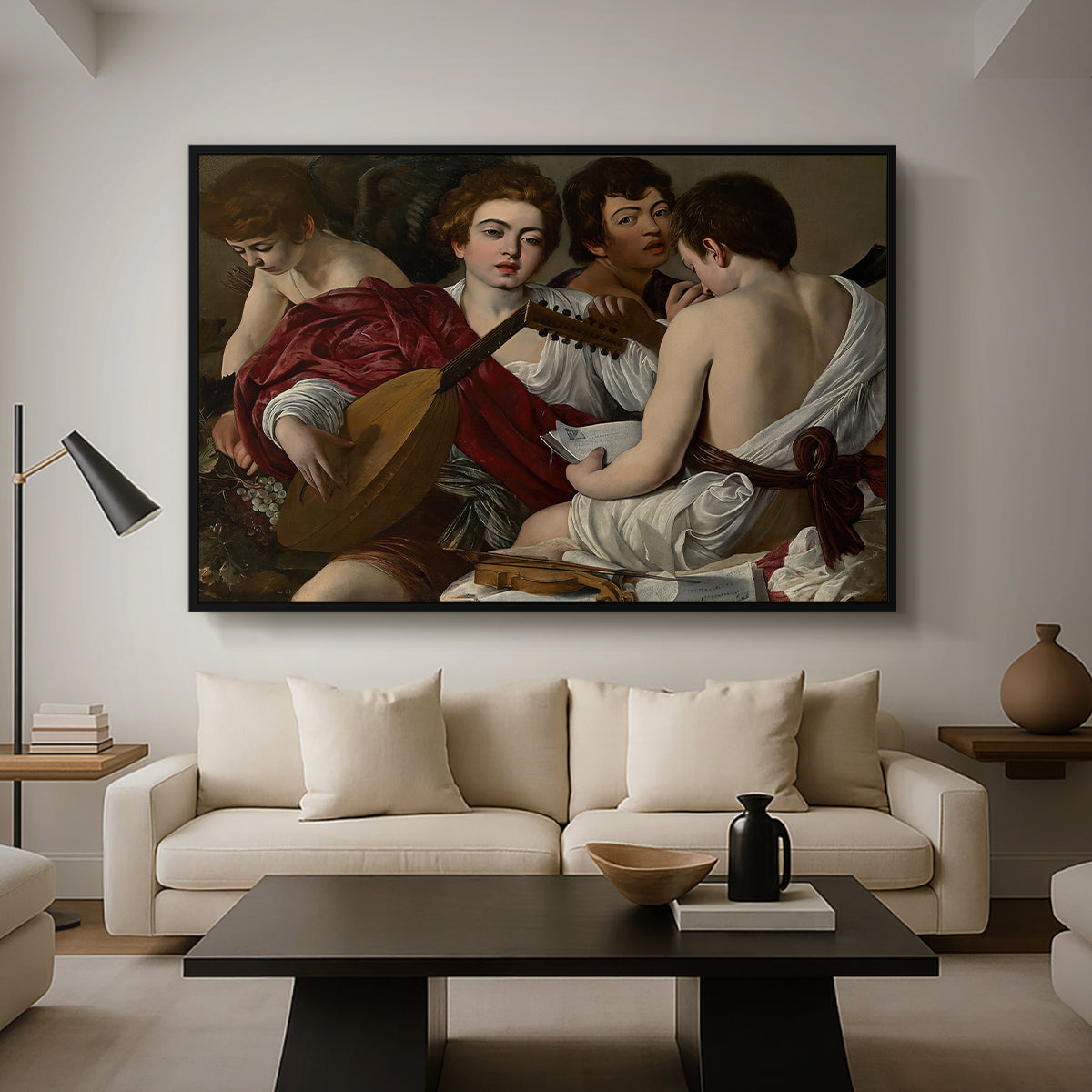 The Musicians, c. 1595 by Caravaggio as a black floater framed canvas featuring a group of young men gathered together playing music with instruments, displayed above a sofa in a modern living room.
