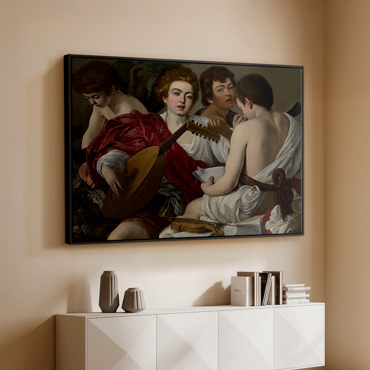 Black floater framed canvas of The Musicians, c. 1595 by Caravaggio, featuring an ensemble of musicians holding lute and singing in close arrangement above a console cabinet in a minimalist entryway.