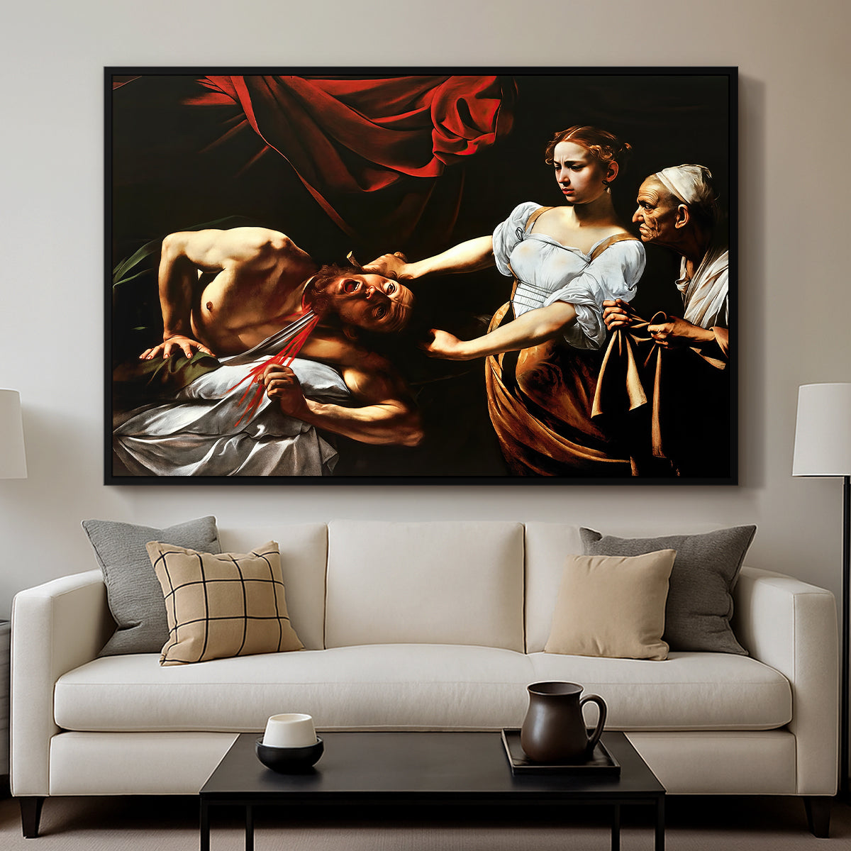 Judith Beheading Holofernes, c. 1599 by Caravaggio displayed in a black floater framed canvas above a sofa in a clean living room.