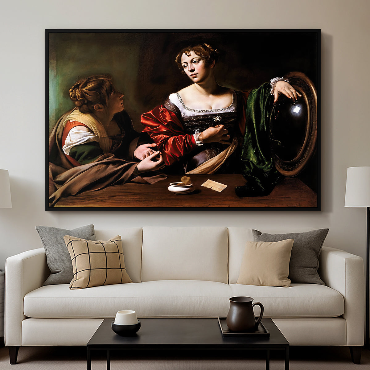 Martha and Mary Magdalene, c. 1598 by Caravaggio displayed in a black floater framed canvas above a sofa in a clean living room.