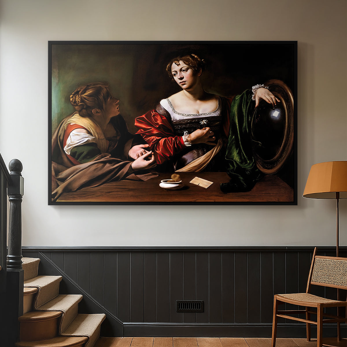 Black floater framed canvas featuring a religious interior scene with figures engaged in thoughtful dialogue, displayed in a hallway near a staircase.