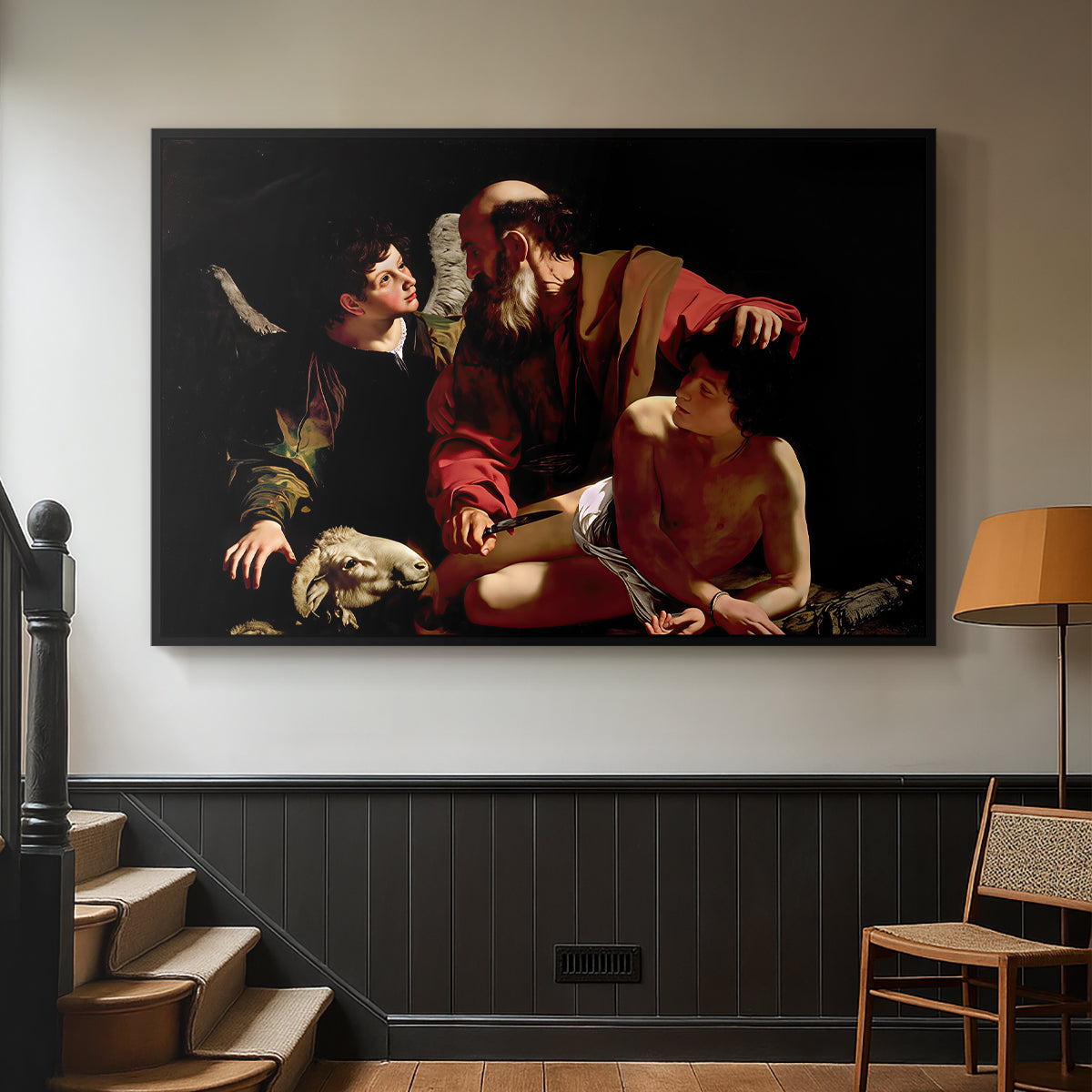 Black floater framed canvas featuring an intense religious narrative with figures in close physical struggle, displayed in a hallway near a staircase.