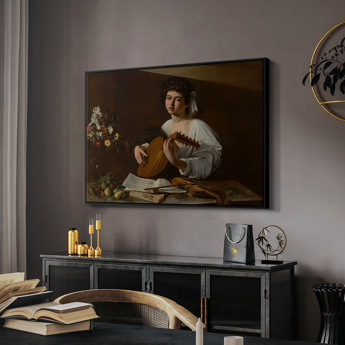 The Lute Player (Hermitage Version), c. 1596 by Caravaggio in a black floater framed canvas featuring an intimate musical scene with instrument and decorative objects, displayed above a desk in a dark home office interior.