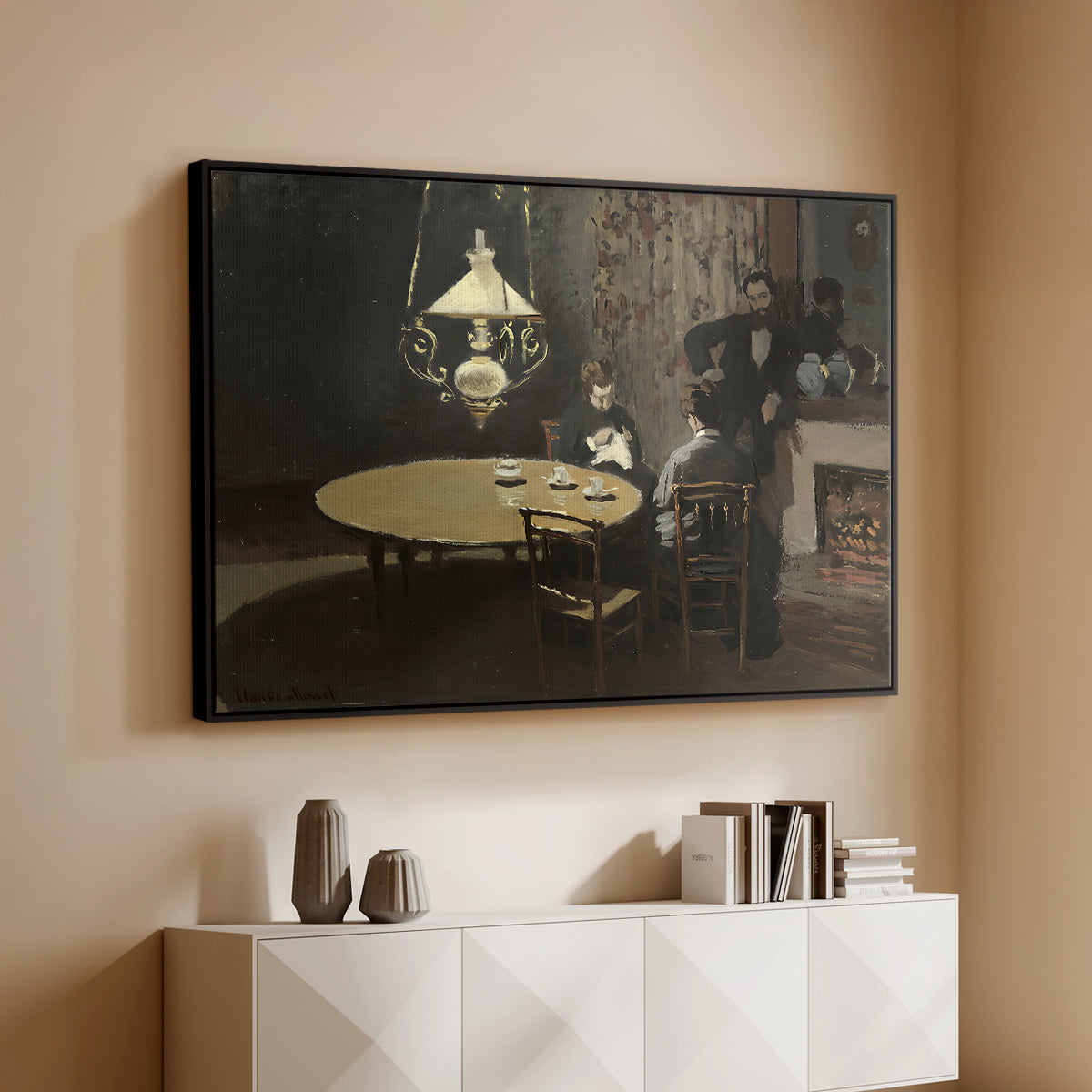 Black floater framed canvas of Interior, after Dinner, 1868-1869 by Claude Monet, featuring a quiet domestic scene with lamp-lit table and subdued atmosphere above a console cabinet in a minimalist entryway.