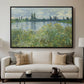Banks of the Seine, Vétheuil, 1880 by Claude Monet displayed in a black floater framed canvas above a sofa in a clean living room.