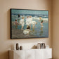 Black floater framed canvas of A Holiday, c. 1915 by Edward Henry Potthast, featuring a beach scene with figures bathing and standing in waves under bright sky above a console cabinet in a minimalist entryway.