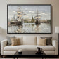 Ships Riding on the Seine at Rouen, 1872 by Claude Monet displayed in a black floater framed canvas above a sofa in a clean living room.