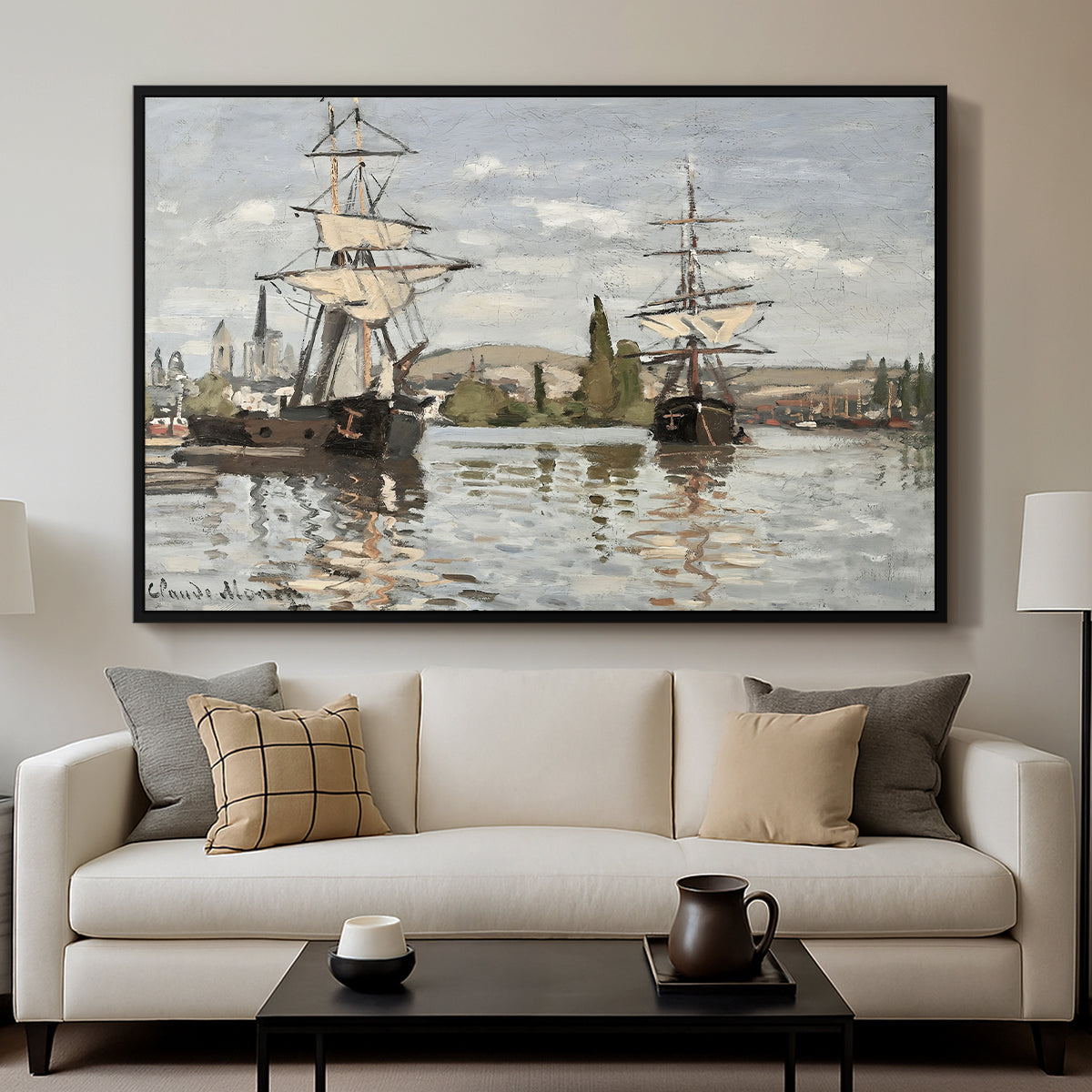 Ships Riding on the Seine at Rouen, 1872 by Claude Monet displayed in a black floater framed canvas above a sofa in a clean living room.