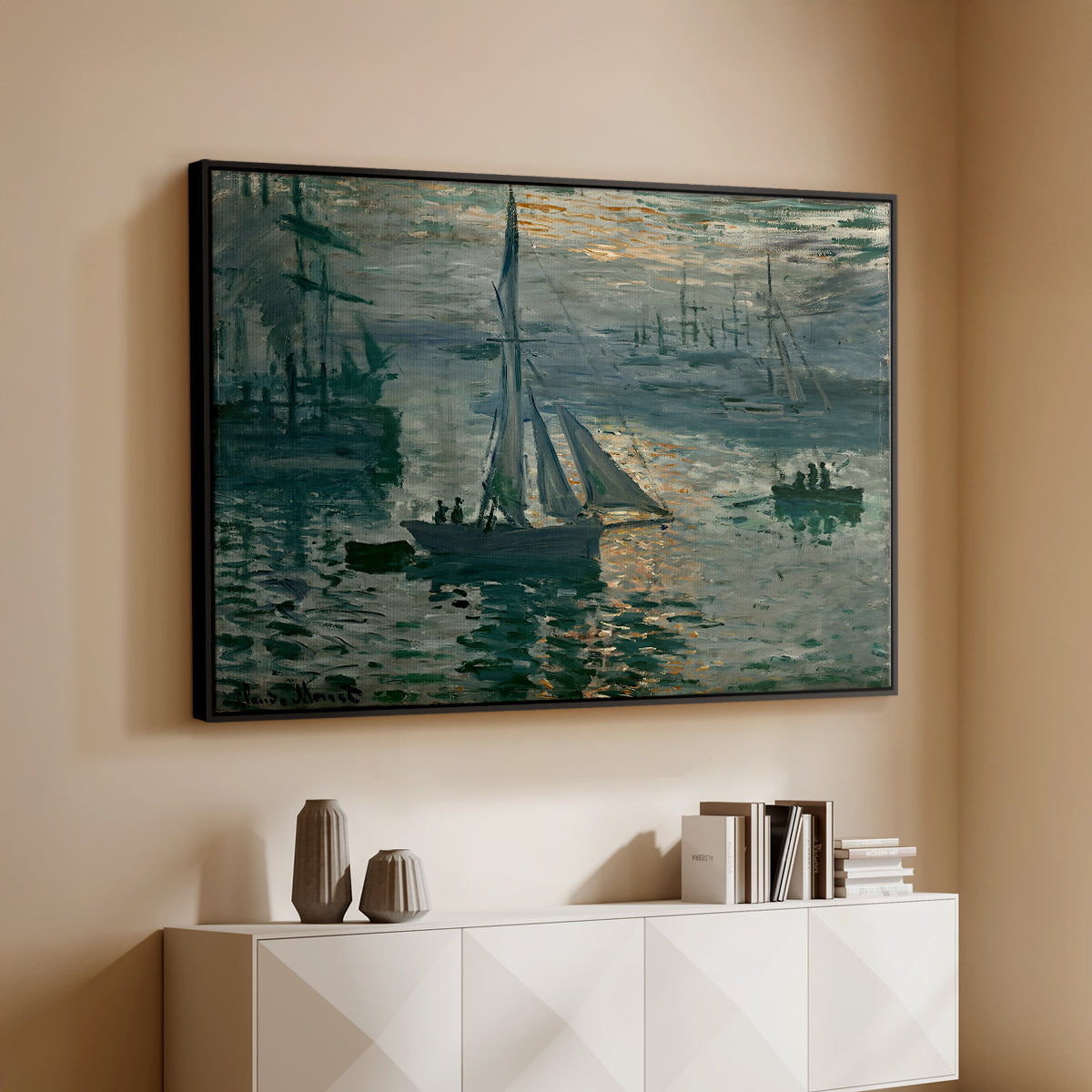 Black floater framed canvas of Sunrise (Marine), 1873 by Claude Monet, featuring an impressionist seascape with glowing sun and misty water above a console cabinet in a minimalist entryway.