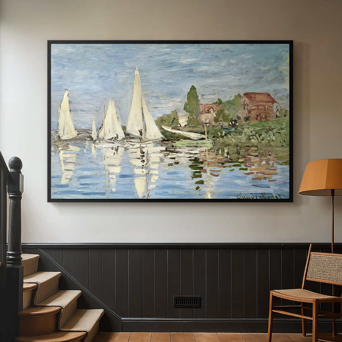 Black floater framed canvas featuring a dynamic nautical scene with boats moving across river, displayed in a hallway near a staircase.