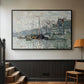 Black floater framed canvas featuring a harbor view with masts, houses, and reflections in water, displayed in a hallway near a staircase.