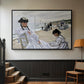 Black floater framed canvas featuring a coastal leisure scene with figures looking out to sea, displayed in a hallway near a staircase.