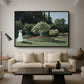Woman in the Garden, Sainte-Adresse, 1867 by Claude Monet as a black floater framed canvas featuring a woman standing in garden surrounded by flowers and greenery, displayed above a sofa in a modern living room.