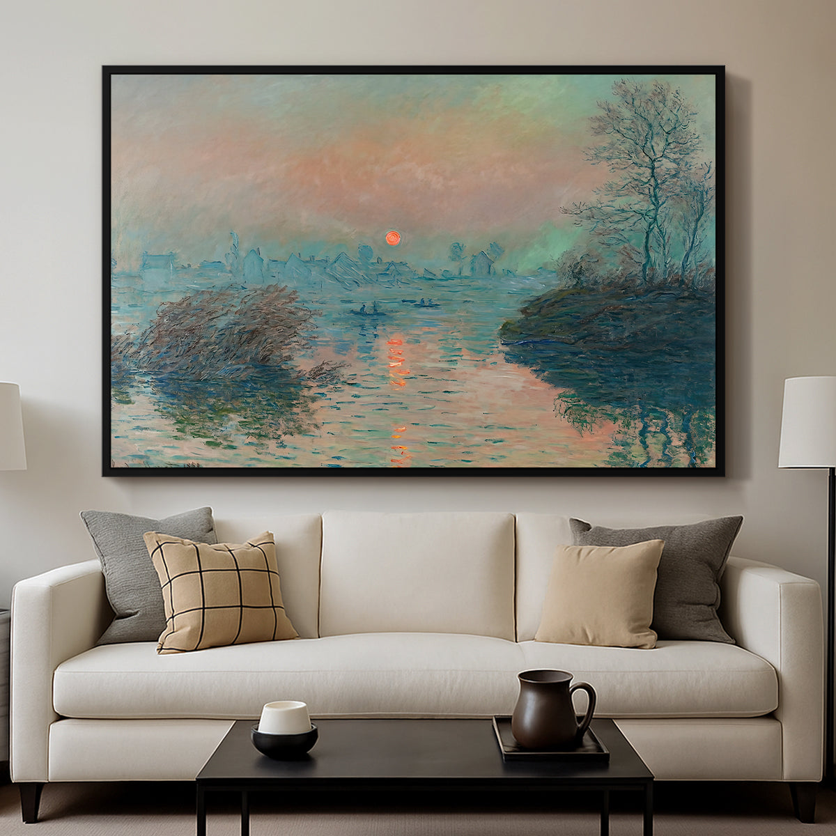 Sunset on the Seine at Lavacourt, Winter Effect, 1880 by Claude Monet displayed in a black floater framed canvas above a sofa in a clean living room.