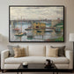 Bridge at Argenteuil on a Gray Day, c. 1876 by Claude Monet displayed in a black floater framed canvas above a sofa in a clean living room.