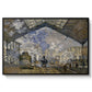 The Gare Saint-Lazare, 1877 by Claude Monet in a black floater framed canvas wall art display.