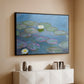 Black floater framed canvas of Water Lilies (Nymphéas), 1897-1899 by Claude Monet, featuring an impressionist pond scene with lily pads and soft reflections above a console cabinet in a minimalist entryway.