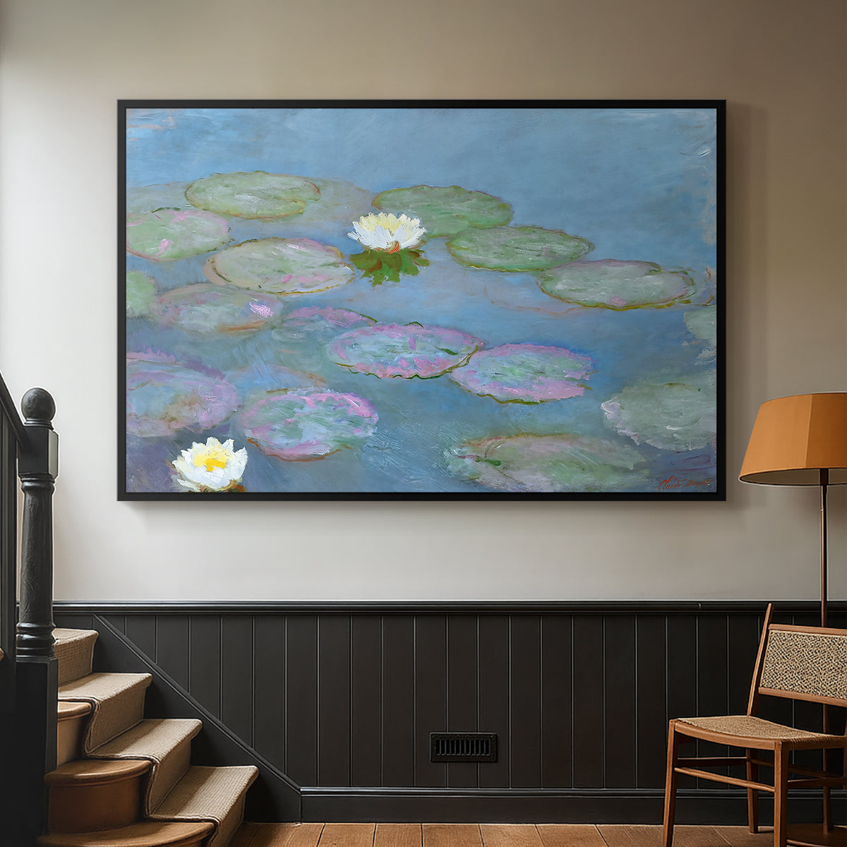 Black floater framed canvas featuring a close-up of aquatic plants in still water, displayed in a hallway near a staircase.