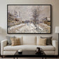 The Boulevard de Pontoise at Argenteuil, Snow Effect, 1875 by Claude Monet displayed in a black floater framed canvas above a sofa in a clean living room.