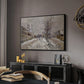 The Boulevard de Pontoise at Argenteuil, Snow Effect, 1875 by Claude Monet in a black floater framed canvas featuring a quiet boulevard blanketed in snow with distant figures, displayed above a desk in a dark home office interior.