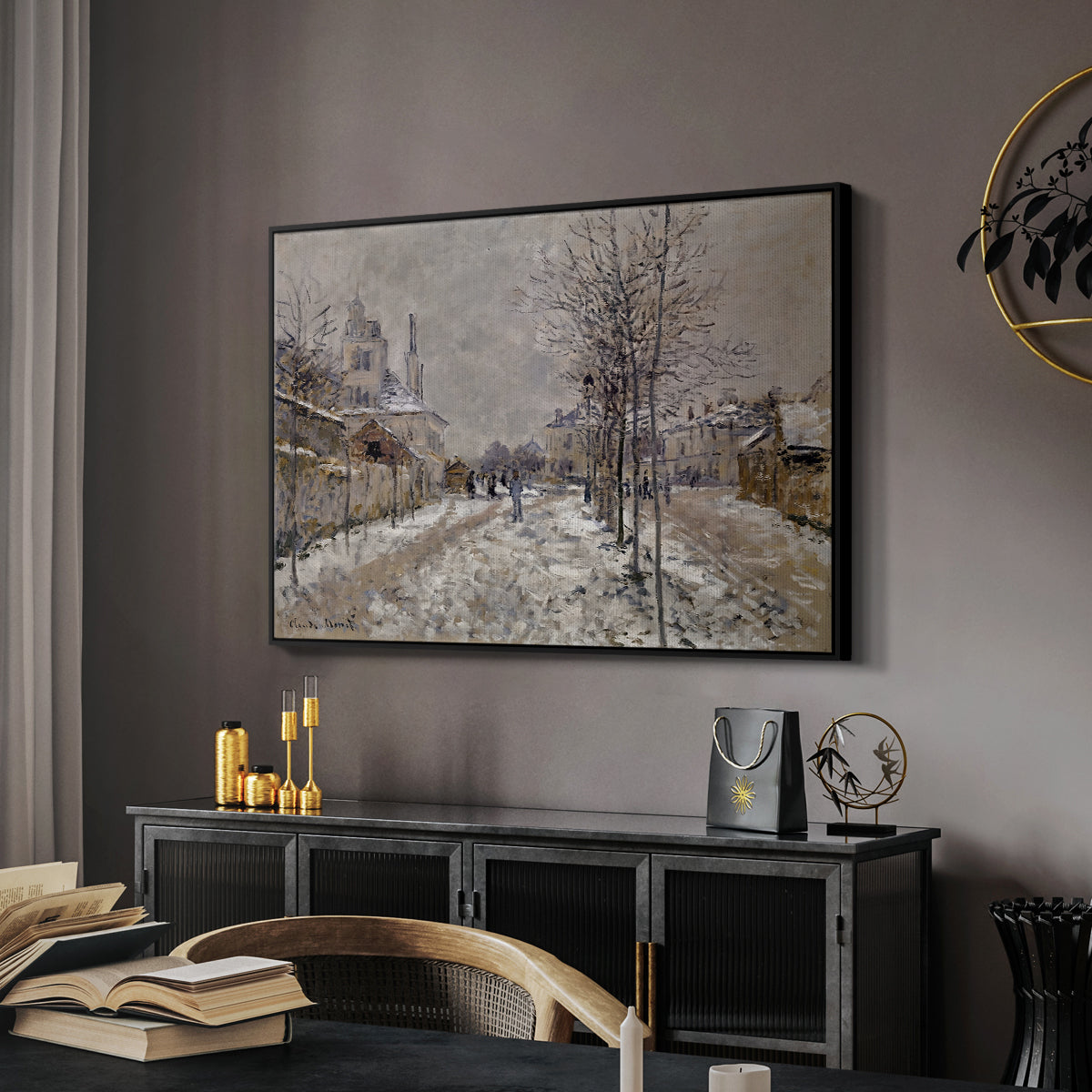 The Boulevard de Pontoise at Argenteuil, Snow Effect, 1875 by Claude Monet in a black floater framed canvas featuring a quiet boulevard blanketed in snow with distant figures, displayed above a desk in a dark home office interior.