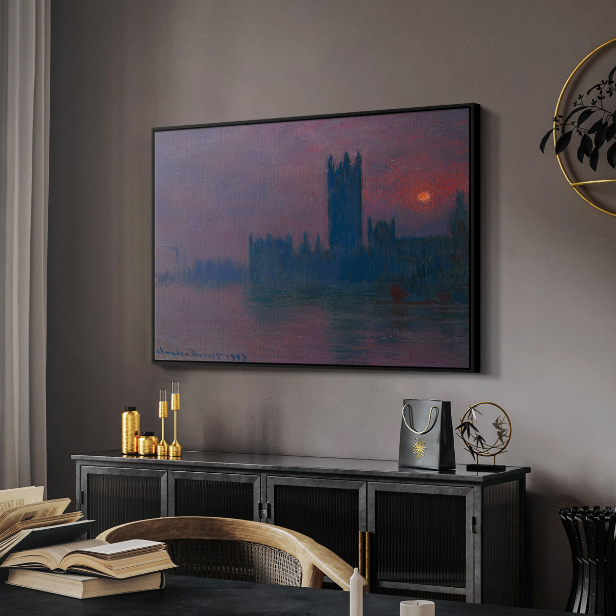 The Houses of Parliament, Sunset, 1903 by Claude Monet in a black floater framed canvas featuring an atmospheric London scene with buildings fading into haze, displayed above a desk in a dark home office interior.