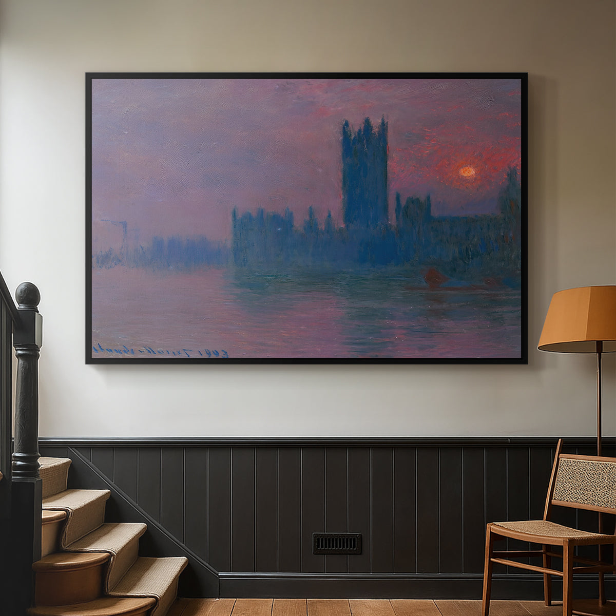 Black floater framed canvas featuring a dramatic skyline with reflections under colorful sky, displayed in a hallway near a staircase.