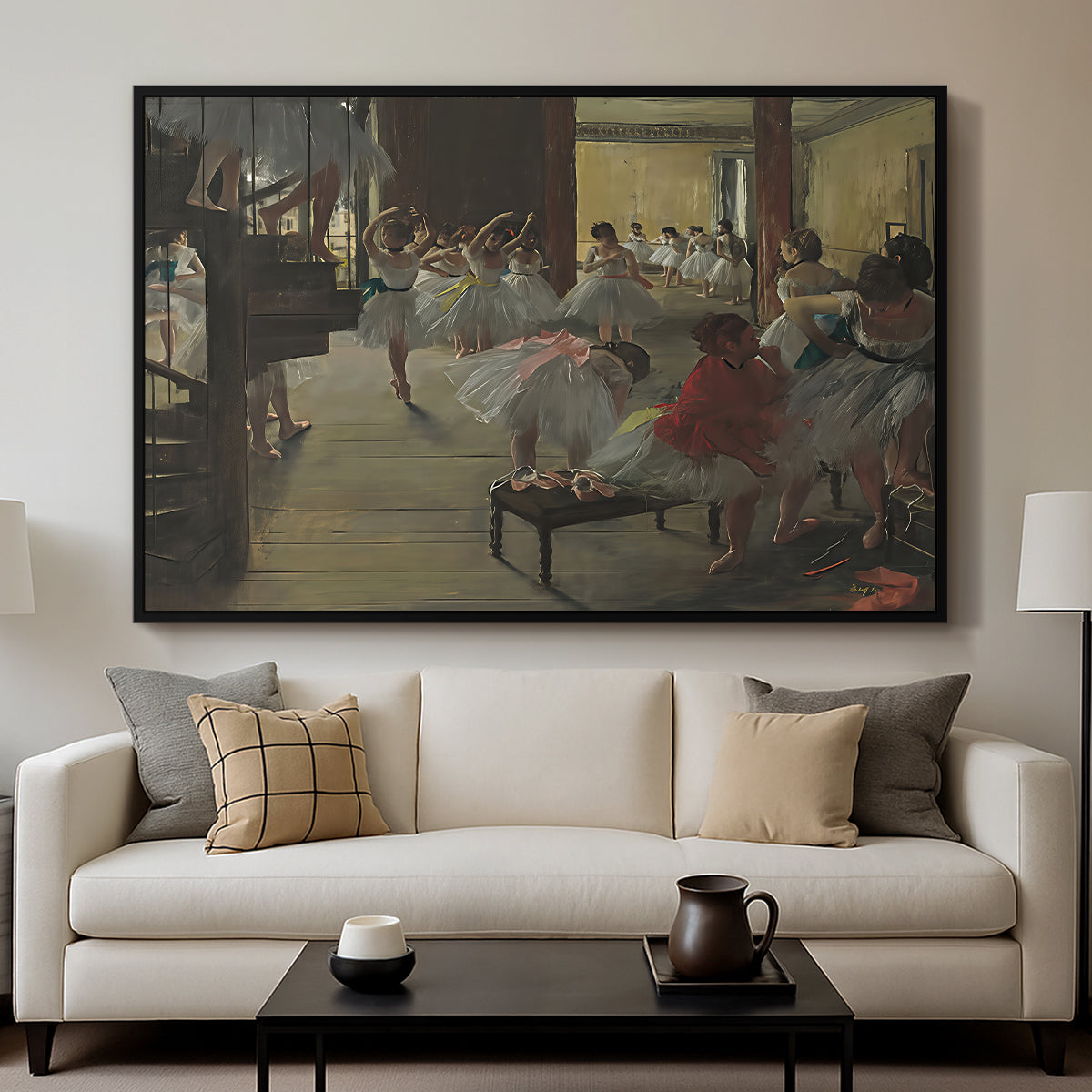 The Dance Class, c. 1873 by Edgar Degas displayed in a black floater framed canvas above a sofa in a clean living room.