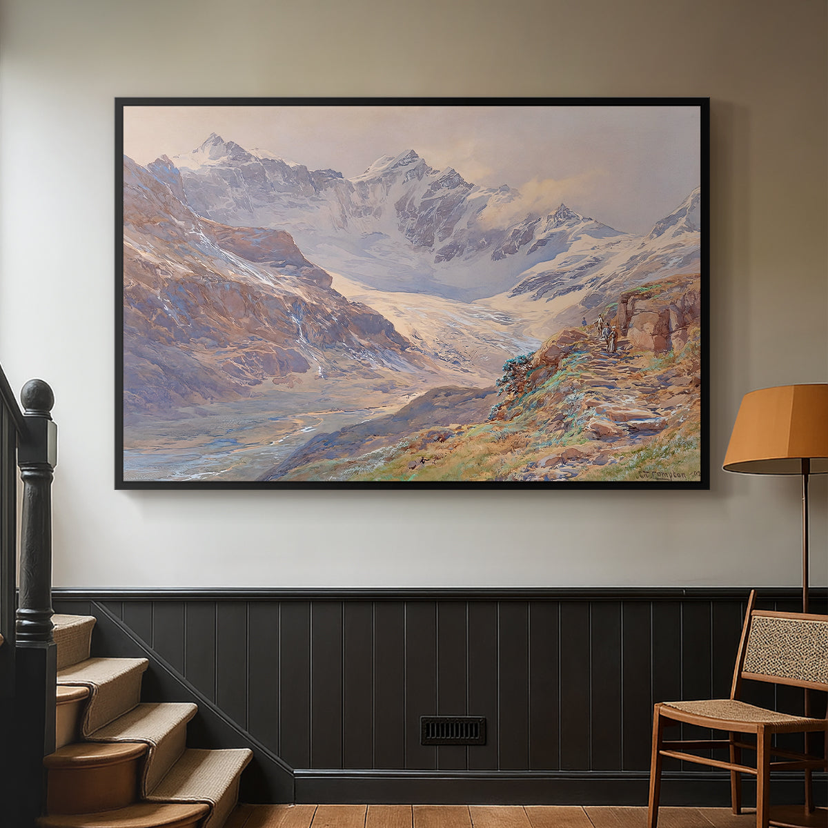 Black floater framed canvas featuring an expansive alpine view with ice and distant mountains, displayed in a hallway near a staircase.
