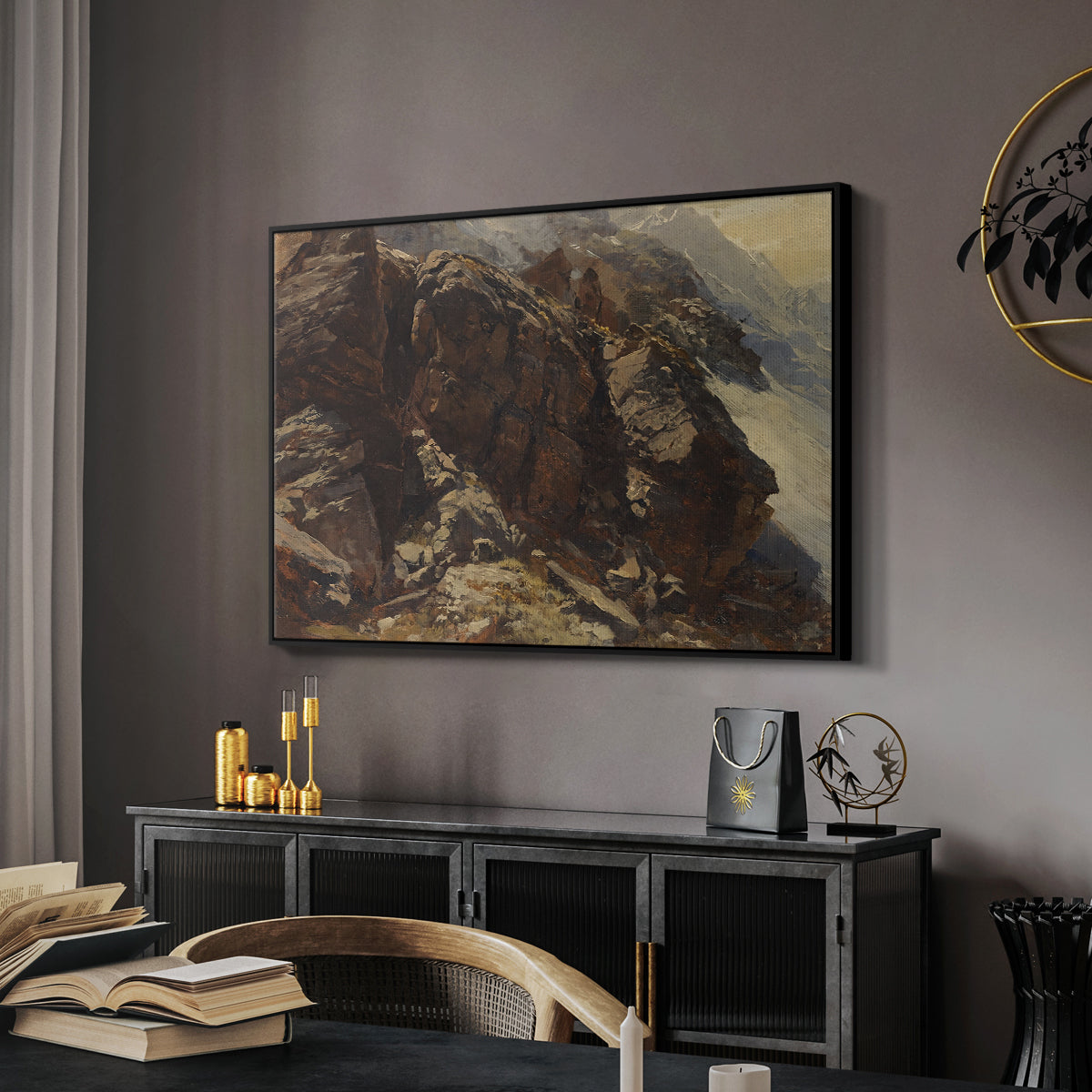 High Mountain Study, c. 1870 by Edward Theodore Compton in a black floater framed canvas featuring a high-altitude scene with rocky formations and sparse vegetation, displayed above a desk in a dark home office interior.