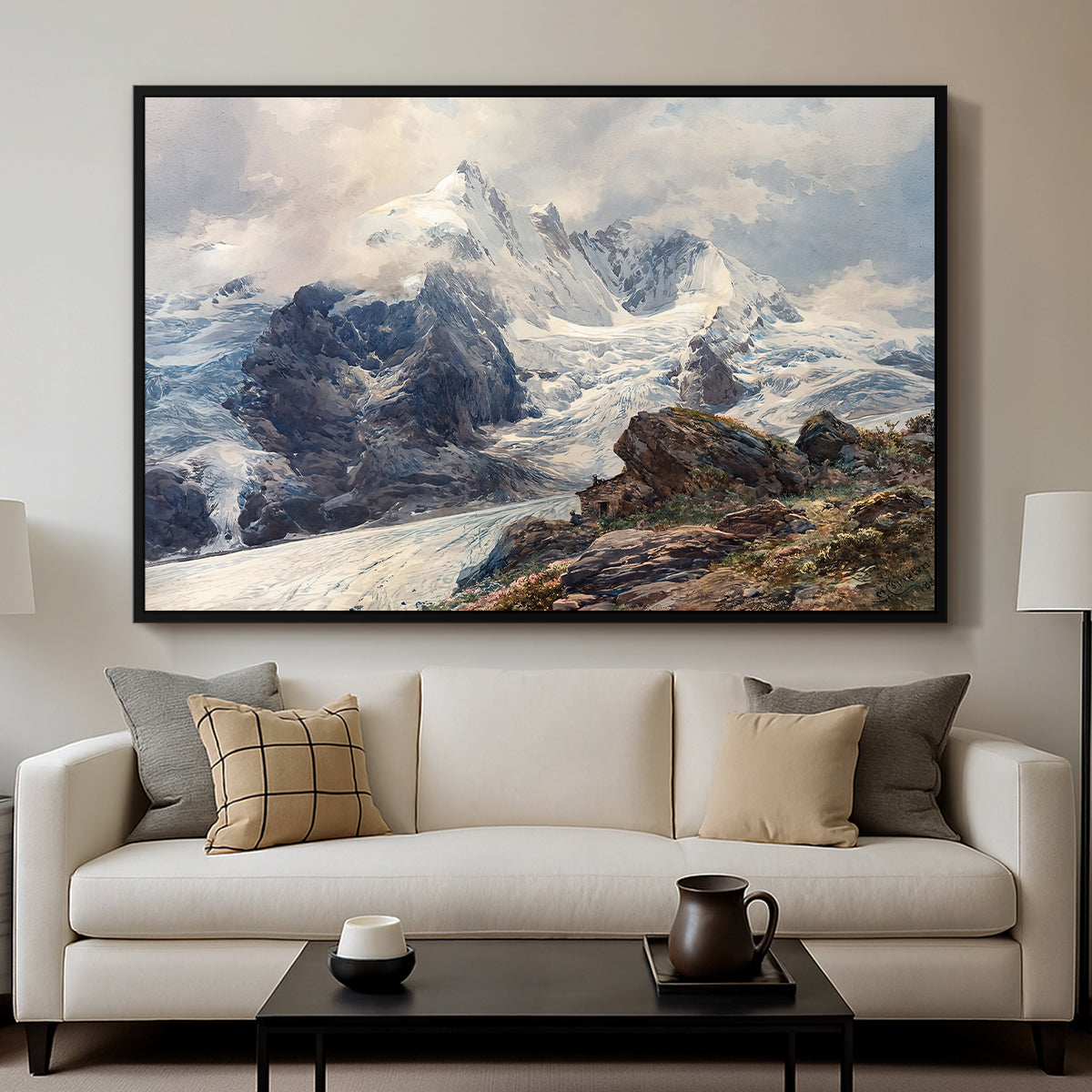 The Grossglockner, 1880 by Edward Theodore Compton displayed in a black floater framed canvas above a sofa in a clean living room.