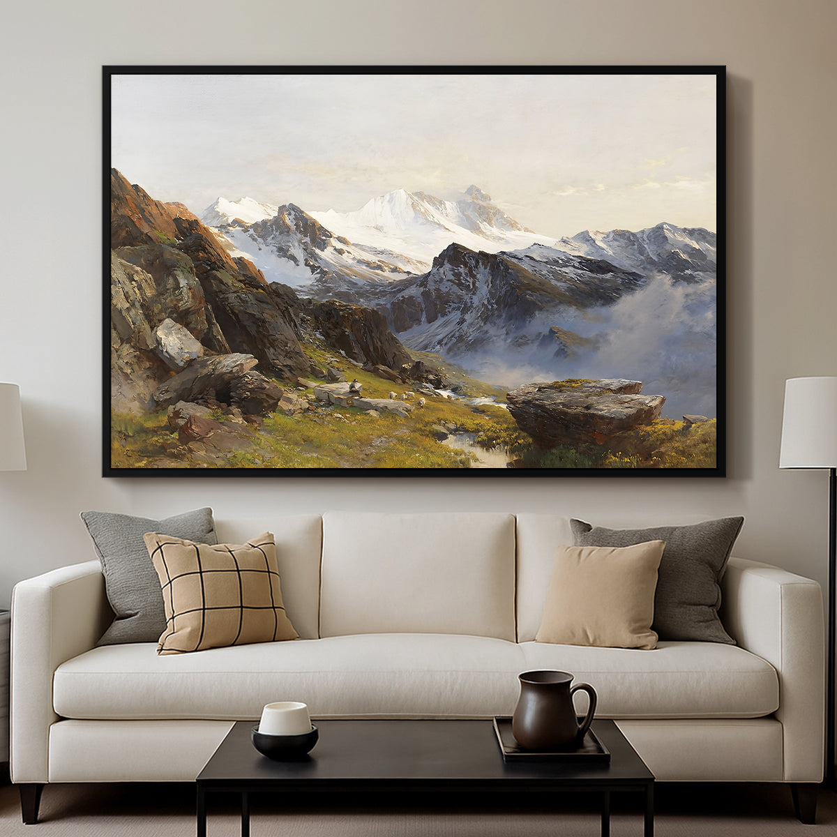 The Großglockner from the Prager Hut, 1890 by Edward Theodore Compton displayed in a black floater framed canvas above a sofa in a clean living room.